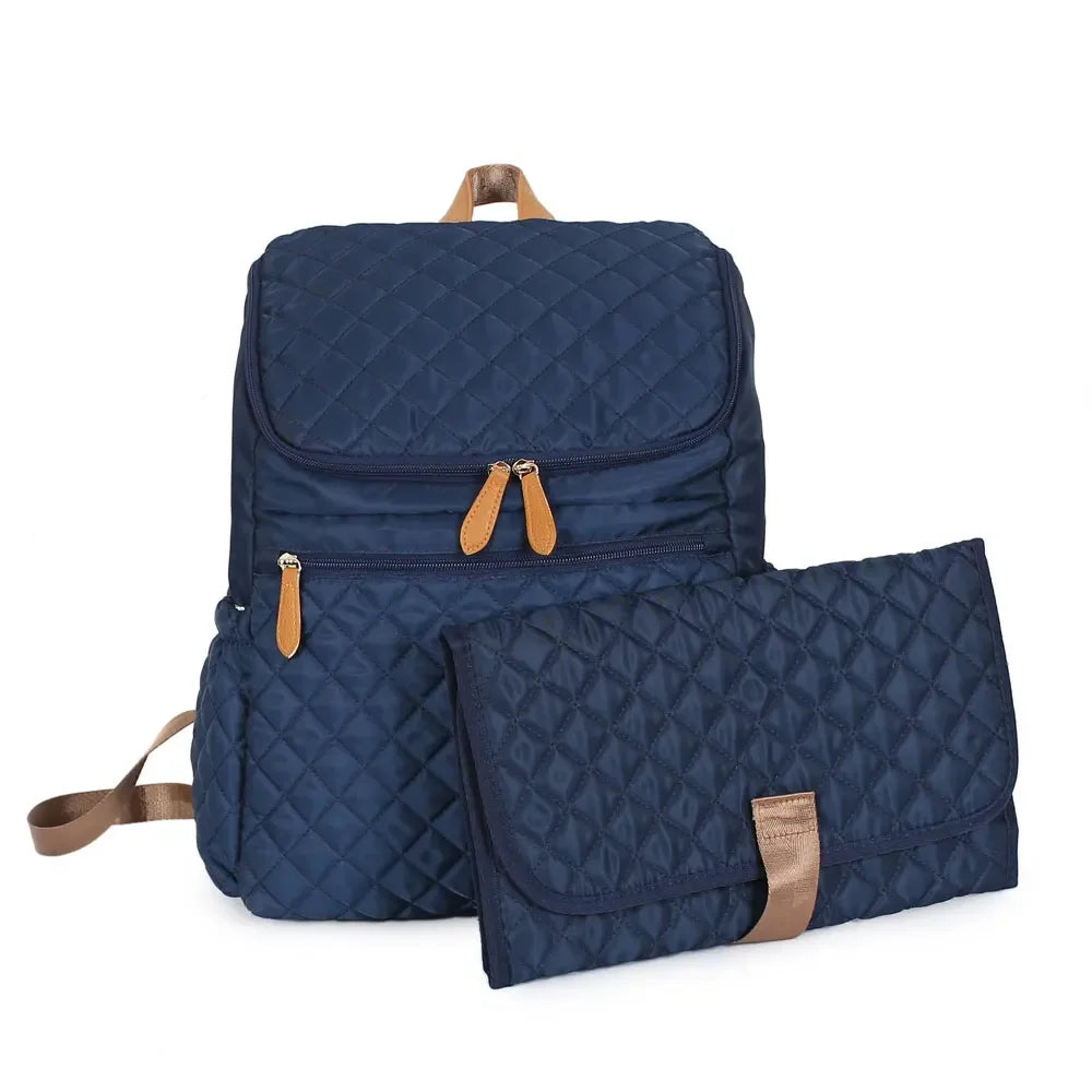 Nova Mart denim diaper bag backpack with thermal bottle pocket, spacious and stylish for parents on the go.