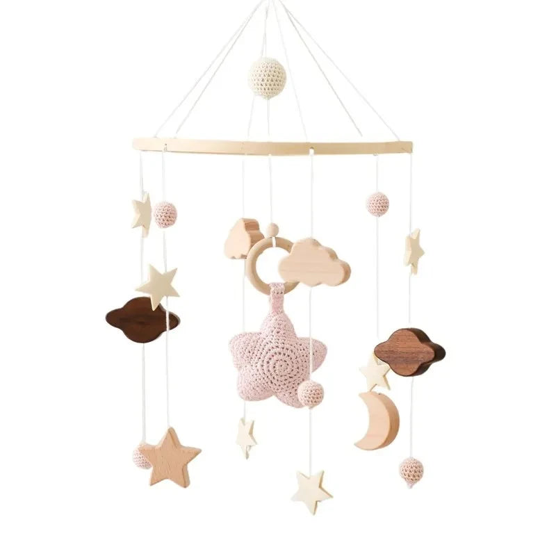 Wooden baby crib rattle toy with crochet bed bell bracket for infants 0-12 months, in natural wood finish.