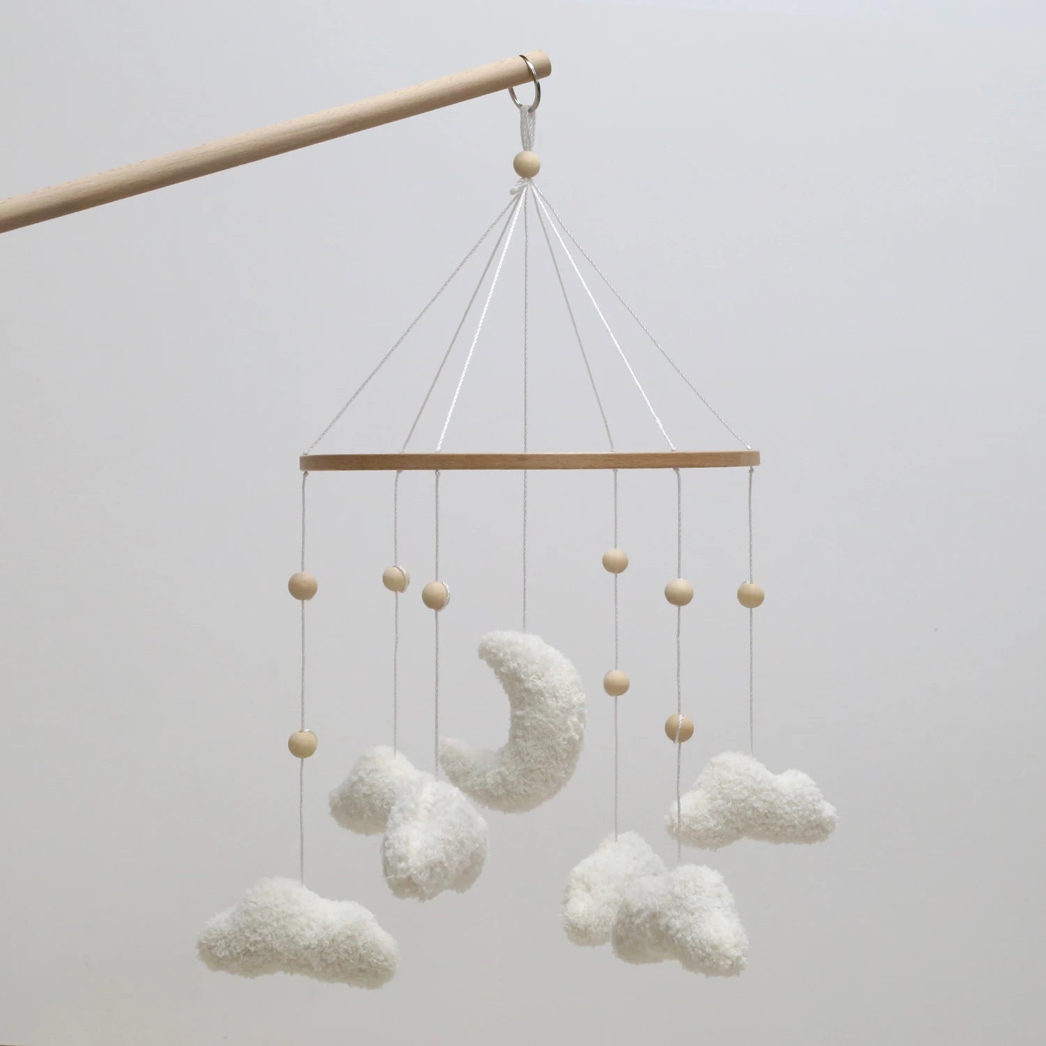 Nova Mart Boucle Clouds & Moon Baby Mobile in neutral nursery colors, featuring soft felt clouds and moon for baby toys.