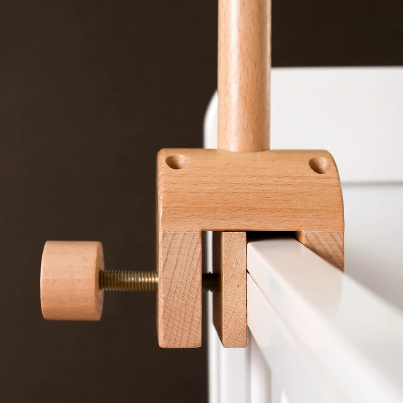 Baby wooden crib mobile with cloud-shaped hanging rattle toy and bracket, designed for infant cribs by Nova Mart.