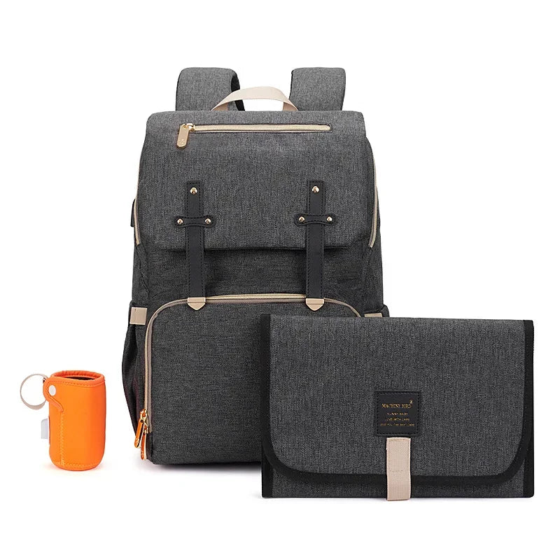 Nova Mart denim baby diaper bag backpack with thermal bottle pocket, featuring multiple compartments and adjustable straps.