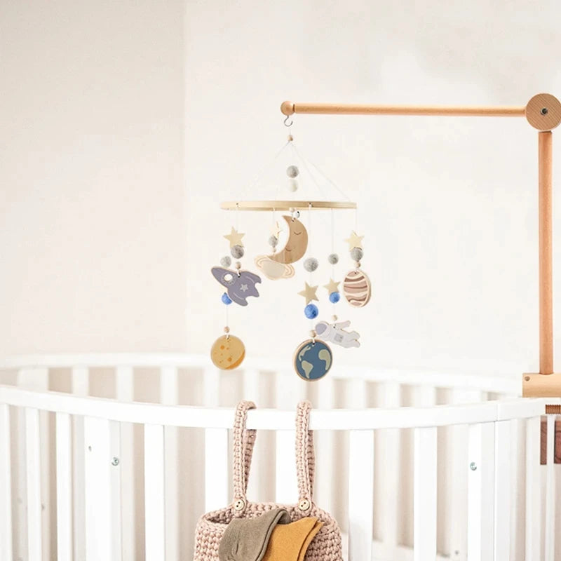 Wooden baby crib rattle toy with crochet bed bell bracket for infants 0-12 months, made by Nova Mart.