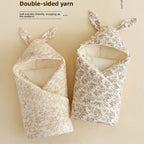 Soft cotton newborn swaddle blanket with bunny ears from Nova Mart, featuring a cozy hospital wrap for newborns.