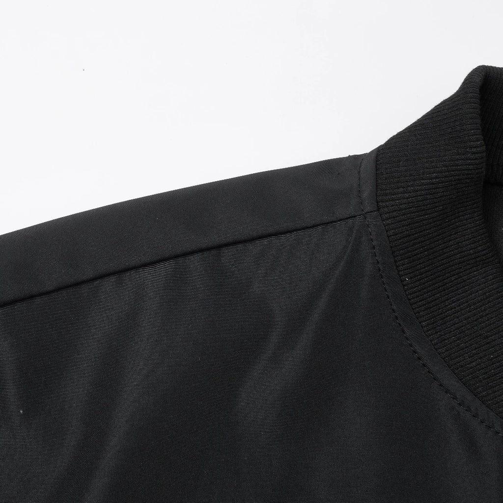 Men's loose fit baseball collar jacket in solid color by Nova Mart, showcasing front view with collar detail.