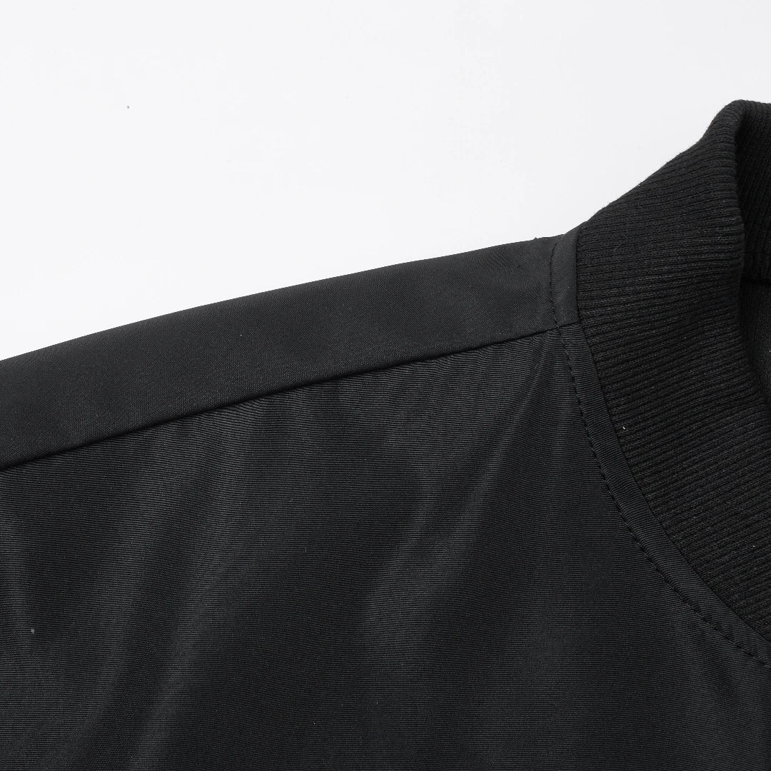 Men's loose fit baseball collar jacket in solid color by Nova Mart, showcasing front view with collar detail.