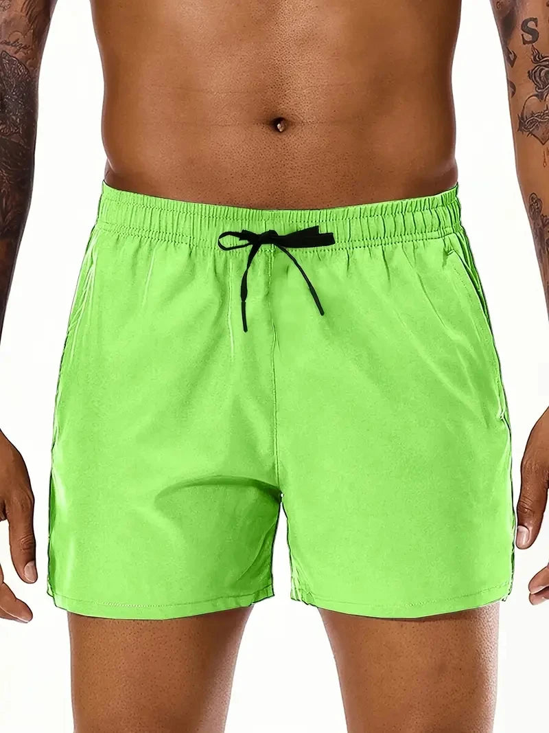 Men's beach sports shorts with elastic waistband and double pockets, perfect for summer casual wear by Nova Mart