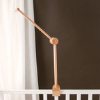 Baby wooden crib mobile with cloud-shaped hanging rattle toy and bracket by Nova Mart, suitable for nursery cribs.