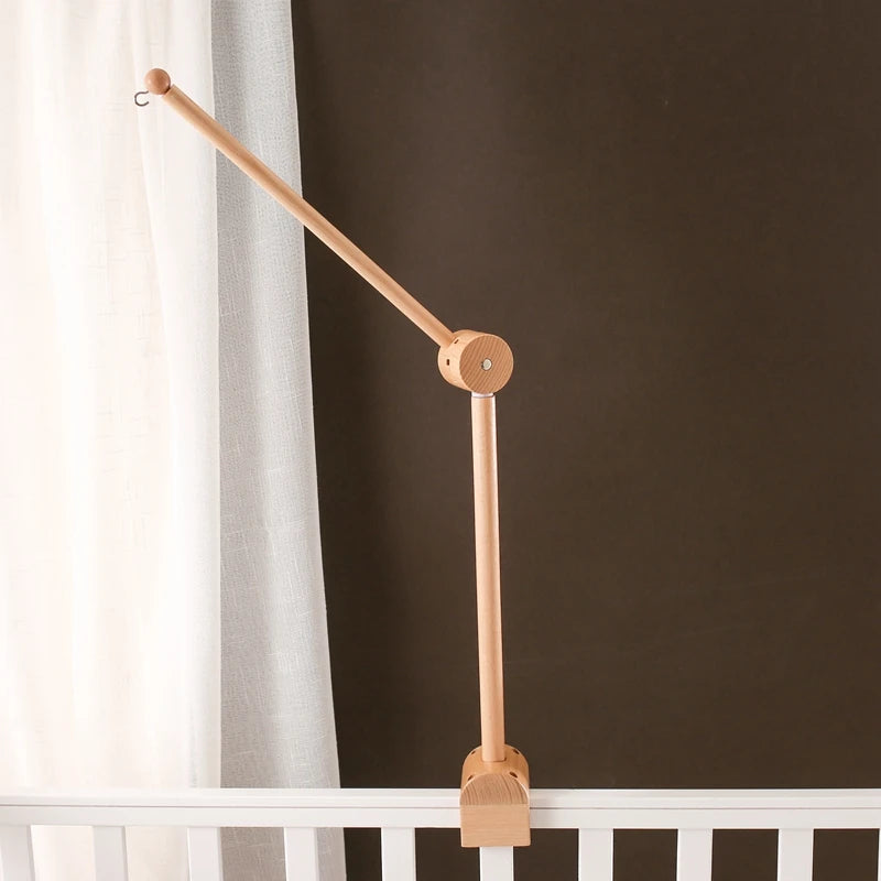 Baby wooden crib mobile with cloud-shaped hanging rattle toy and bracket by Nova Mart, suitable for nursery cribs.