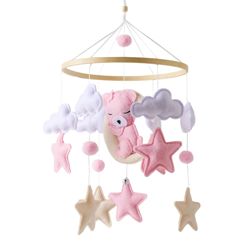 Wooden baby crib mobile by Nova Mart featuring a soft felt cartoon bear and music box for soothing nursery decor.