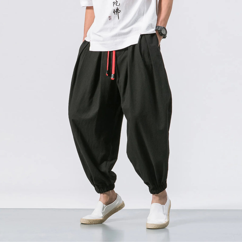 Men's oversize loose linen harem pants by Nova Mart, showcasing relaxed fit and lightweight breathable fabric in natural linen color.