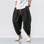 Men's oversize loose linen harem pants by Nova Mart, showcasing relaxed fit and lightweight breathable fabric in natural linen color.