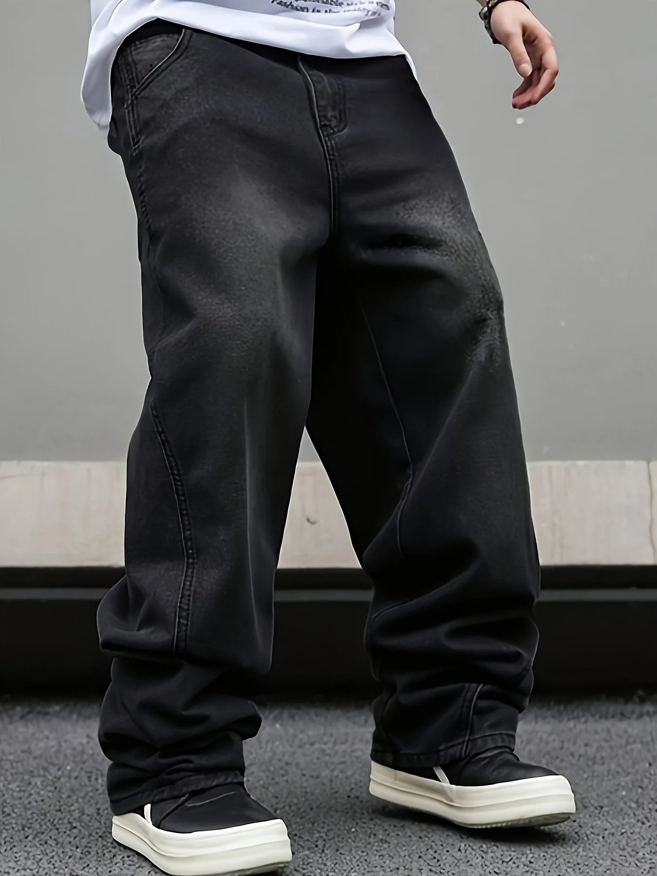 Men's wide leg flared jeans by Nova Mart featuring loose straight fit and pleated denim design.