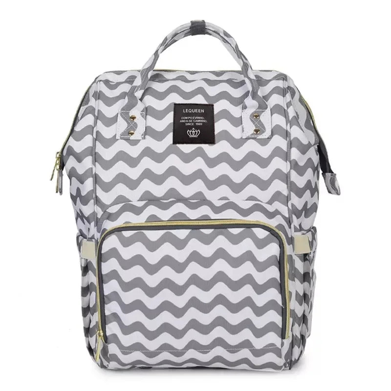 Large capacity Lequeen mummy diaper bag backpack by Nova Mart, featuring multiple compartments for travel and baby essentials.
