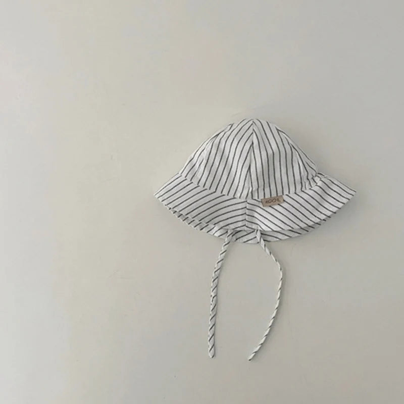 Baby bucket hat by Nova Mart, sunshade fisherman cap for infants and toddlers, soft fabric with wide brim for sun protection.