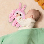 Baby sleep aid palm pillow with remote control by Nova Mart, featuring soft fabric and calming design for soothing sleep.