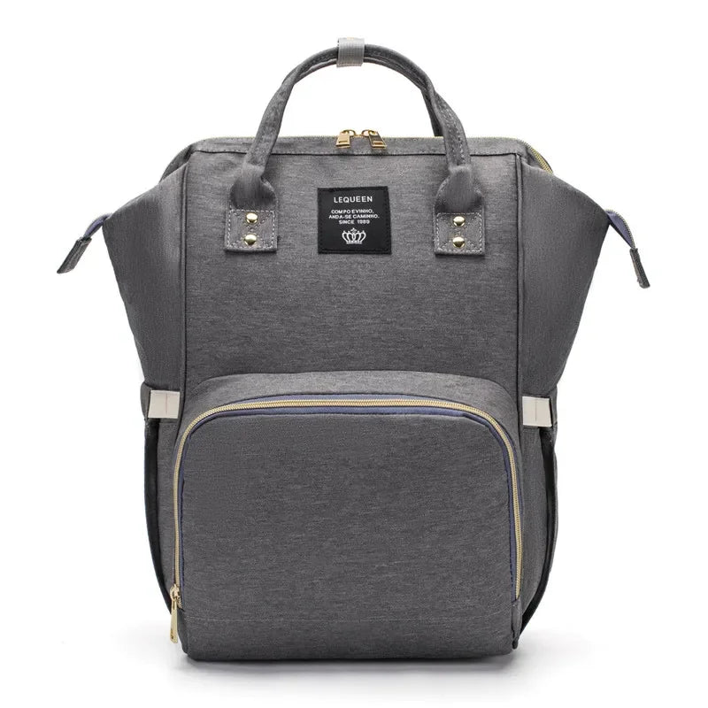 Large capacity Lequeen mummy diaper bag backpack by Nova Mart with multiple compartments for travel and baby essentials.