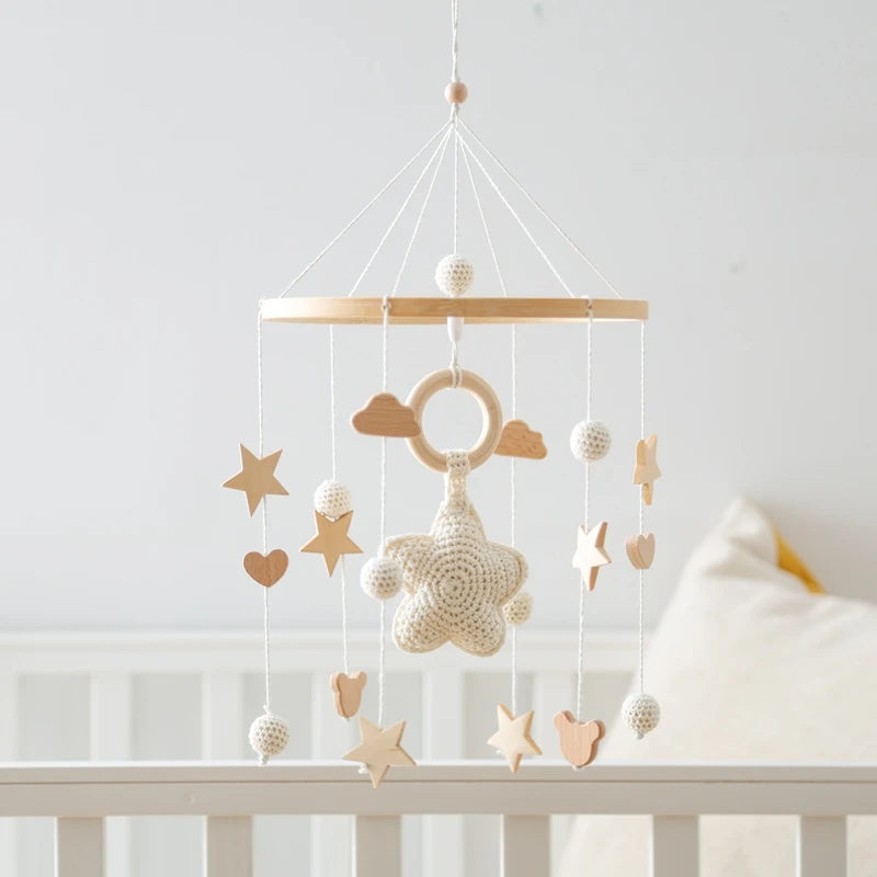 Wooden crochet stars baby crib mobile with bells and rattles, Nova Mart baby toy for soothing and entertainment.