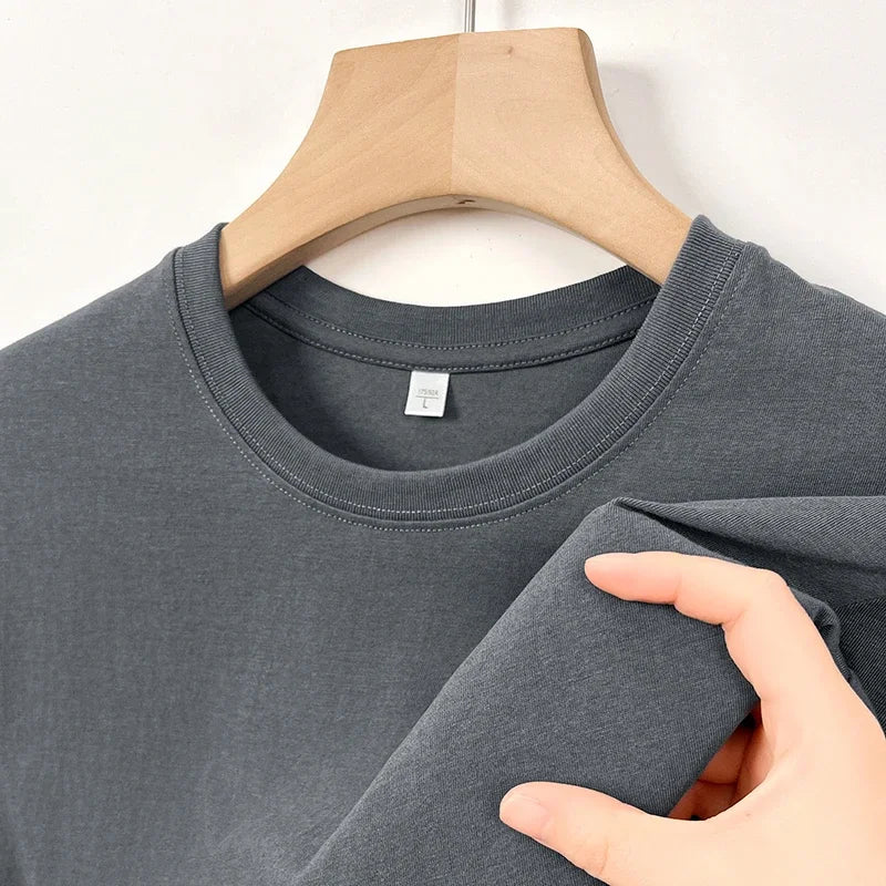 Men's casual cotton round neck T-shirt by Nova Mart, featuring a simple design and comfortable fit in a classic style.