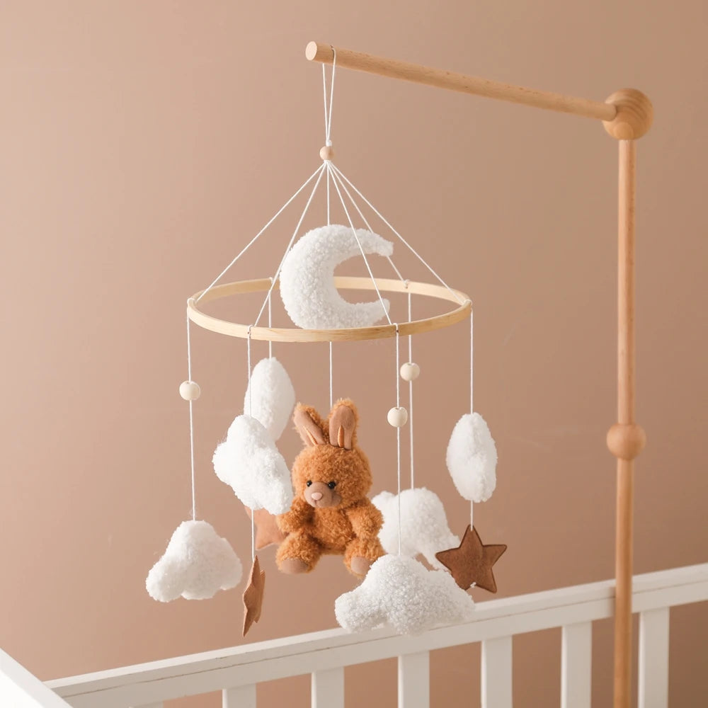 Wooden baby crib mobile by Nova Mart featuring a soft felt cartoon bear and music box for soothing nursery decor.