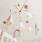 Wooden wind chime baby crib mobile with animal felt dolls and music, designed by Nova Mart for soothing nursery decor.