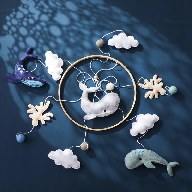 Wooden crochet star baby crib mobile with bell and rattle toy, Nova Mart baby toy for soothing and entertainment.