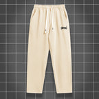 Men's straight leg jogging pants by Nova Mart in solid color, casual sports style, shown in a relaxed fit with waistband and pockets.