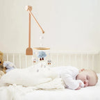 Wooden baby crib rattle toy with crochet bed bell bracket for infants aged 0-12 months, designed by Nova Mart.