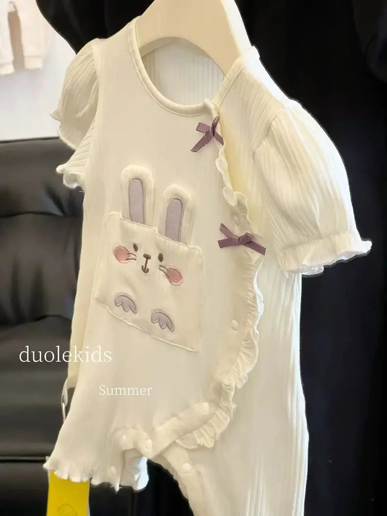 Baby girl summer cartoon romper by Nova Mart, short sleeve climbing jumpsuit with playful cartoon print for warm weather.