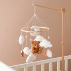 Wooden baby crib mobile with soft felt cartoon bear and music box, designed for infant nurseries by Nova Mart