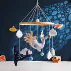 Wooden crochet star baby crib mobile with bed bell rattle toy, designed for infant entertainment and sensory development.