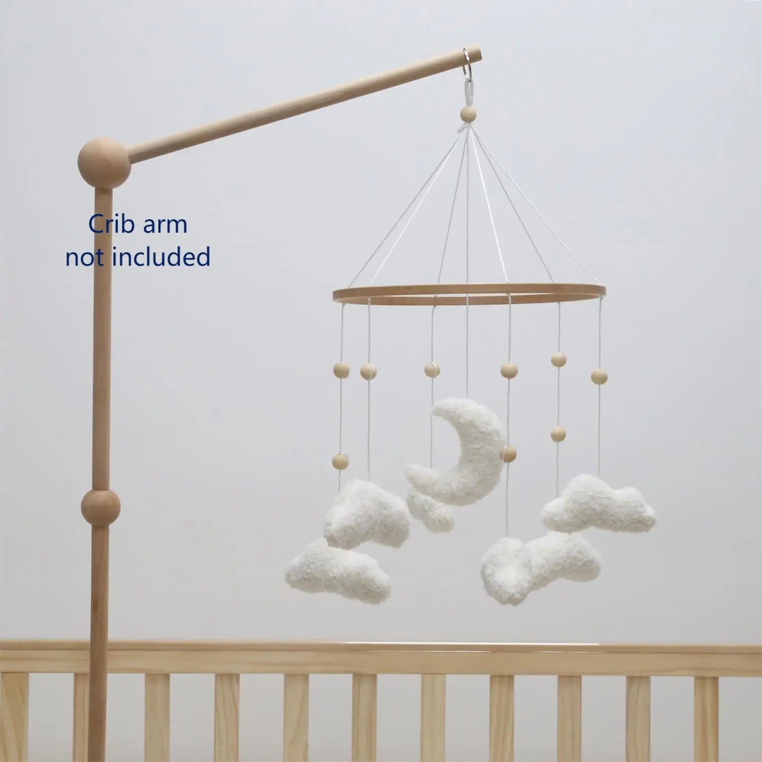 Neutral nursery felt mobile featuring clouds and moon designs, perfect for baby toys and nursery decor by Nova Mart.
