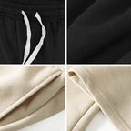 Men's solid color straight leg jogging pants by Nova Mart, casual sportswear, relaxed fit, front pockets, suitable for active and casual wear.