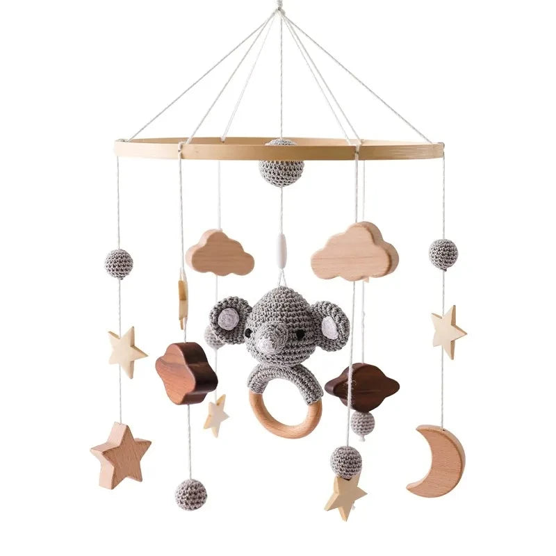 Wooden baby crib rattle toy with crochet bed bell bracket for infants 0-12 months, designed by Nova Mart.