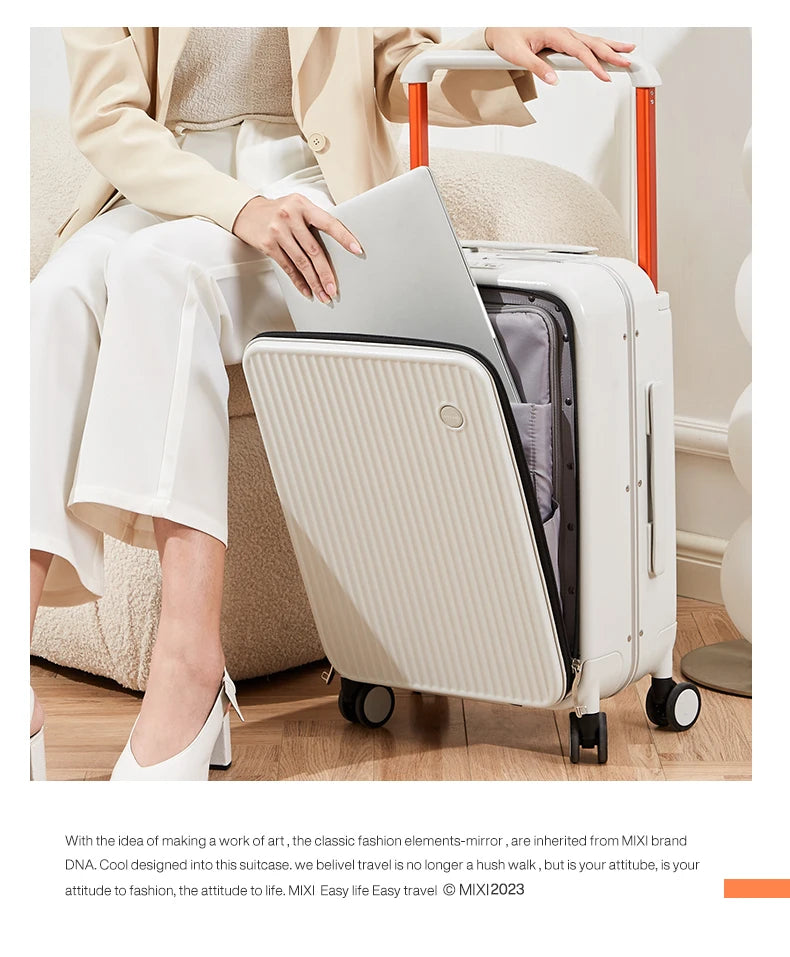 Nova Mart Mixi PC aluminum frame trolley case with laptop pocket, durable luggage with sleek design and sturdy wheels.