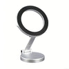 Adjustable magnetic car phone holder from Nova Mart mounted on a vehicle dashboard with a smartphone attached.