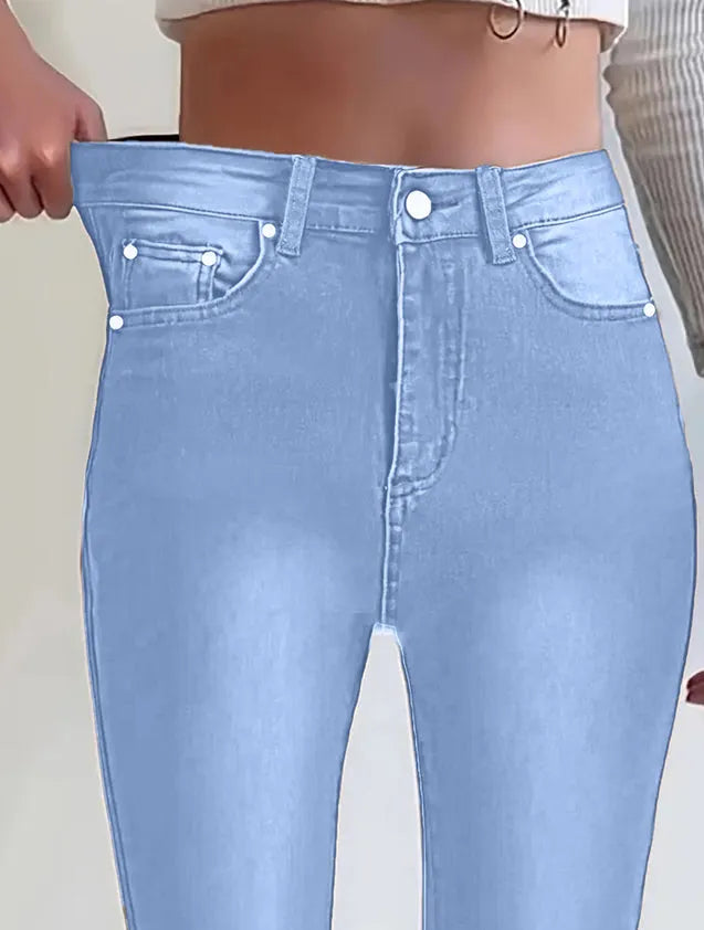 American Retro Nova Mart brown straight-leg denim jeans with classic fit and visible stitching.