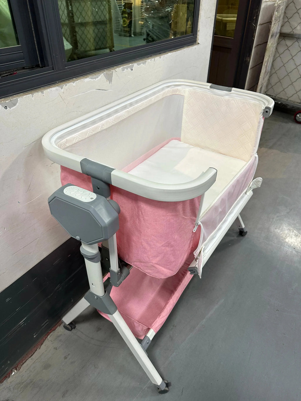 Nova Mart automatic rocking baby bassinet with music and lights, newborn cradle with soft fabric and adjustable features.