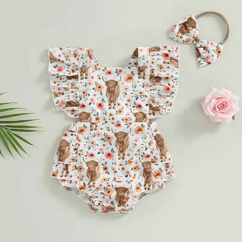 Baby girl wearing a cow print romper and headband, Western cowgirl outfit, cute baby clothing by Nova Mart.