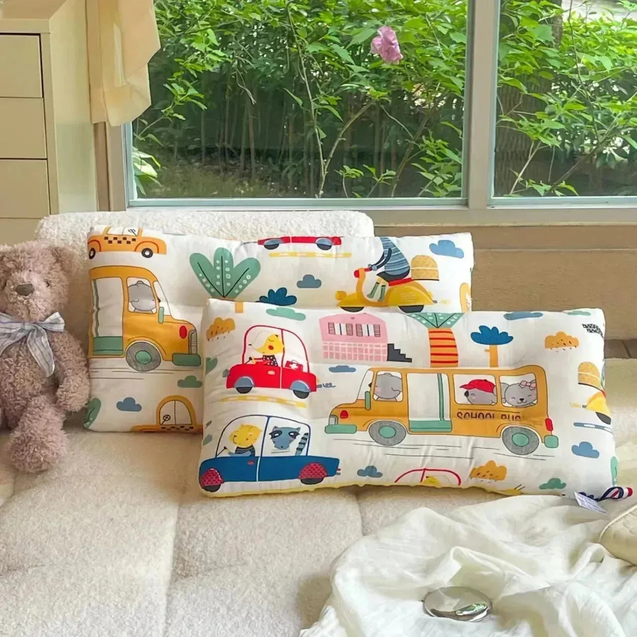 Soft cotton baby sleep pillow with cartoon design, removable and washable, from Nova Mart baby bedding collection.