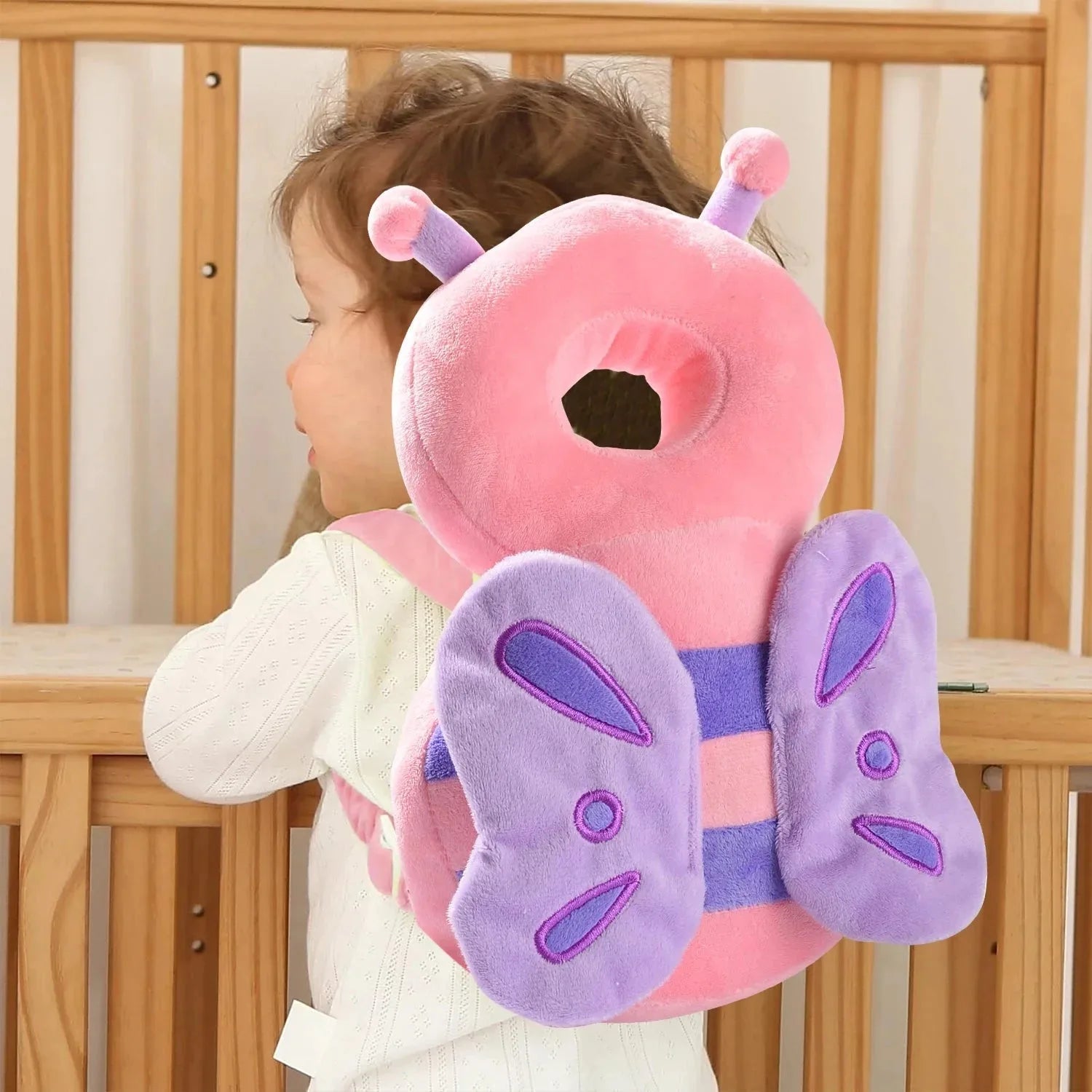 Nova Mart baby safety head protector backpack with soft safety pads for infants, designed to prevent head injuries during walking.