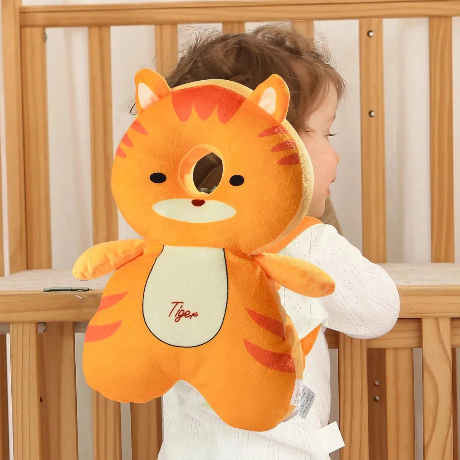 Baby safety head protector backpack by Nova Mart with soft padding to safeguard a baby's head during walking.