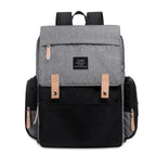 Nova Mart denim diaper bag backpack with thermal bottle pocket, stylish and functional baby diaper bag with multiple compartments.