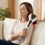 Dual-head electric massager from Nova Mart with infrared heat and adjustable speed controls, shown with ergonomic design and control buttons.