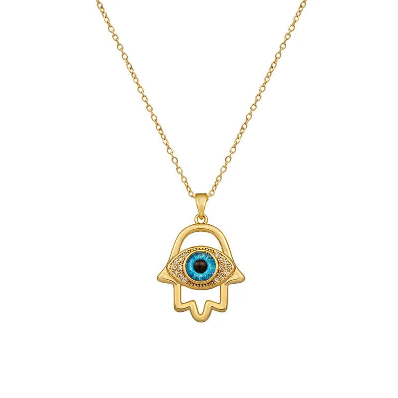 Silver Evil Eye Hamsa Hand necklace for women featuring blue eye charm and intricate design, jewelry by Nova Mart.
