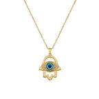 Silver Evil Eye Hamsa Hand necklace for women featuring blue eye charm and intricate design, jewelry by Nova Mart.