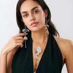 Gold leaf boho choker necklace with tassel pendant, stylish jewelry piece featuring a delicate gold leaf design and tassel detail.