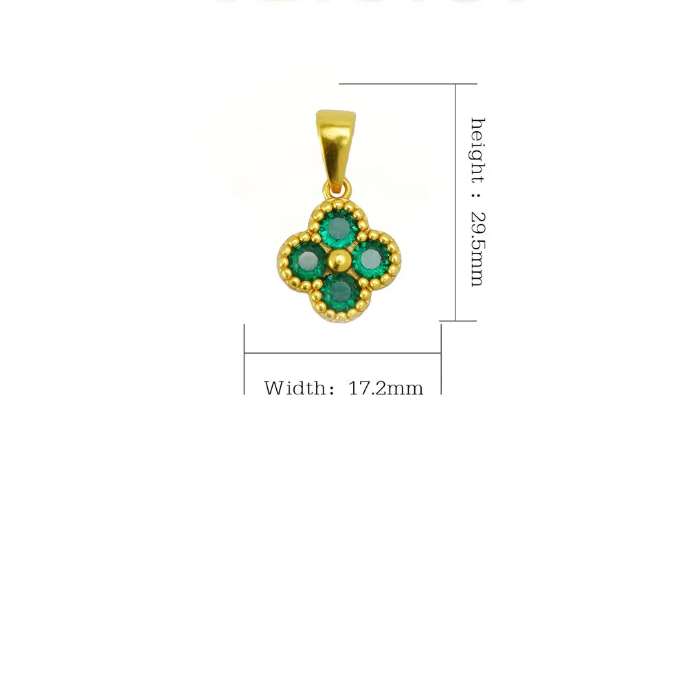 Gold 24K green four-leaf clover necklace with lucky pendant, crafted jewelry by Nova Mart, close-up of pendant on chain.