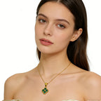 Green 4-leaf clover necklace with a 24K gold pendant, jewelry by Nova Mart, featuring a lucky charm design.