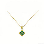 Green 4-leaf clover necklace with a 24K gold pendant, Nova Mart jewelry featuring a lucky charm design.