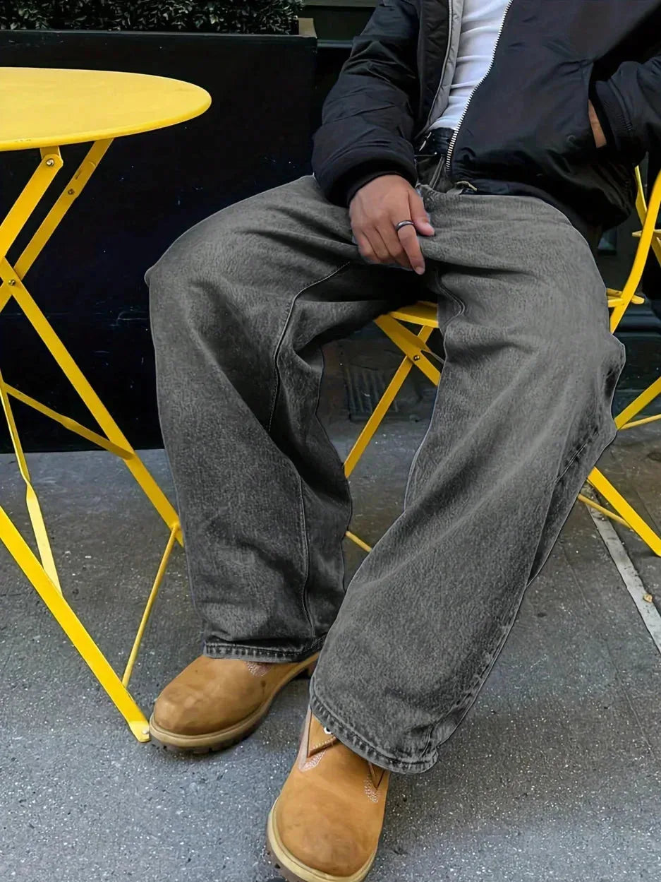Men's casual jeans by Nova Mart featuring anime star patch design and front pockets, made for a stylish, relaxed look.